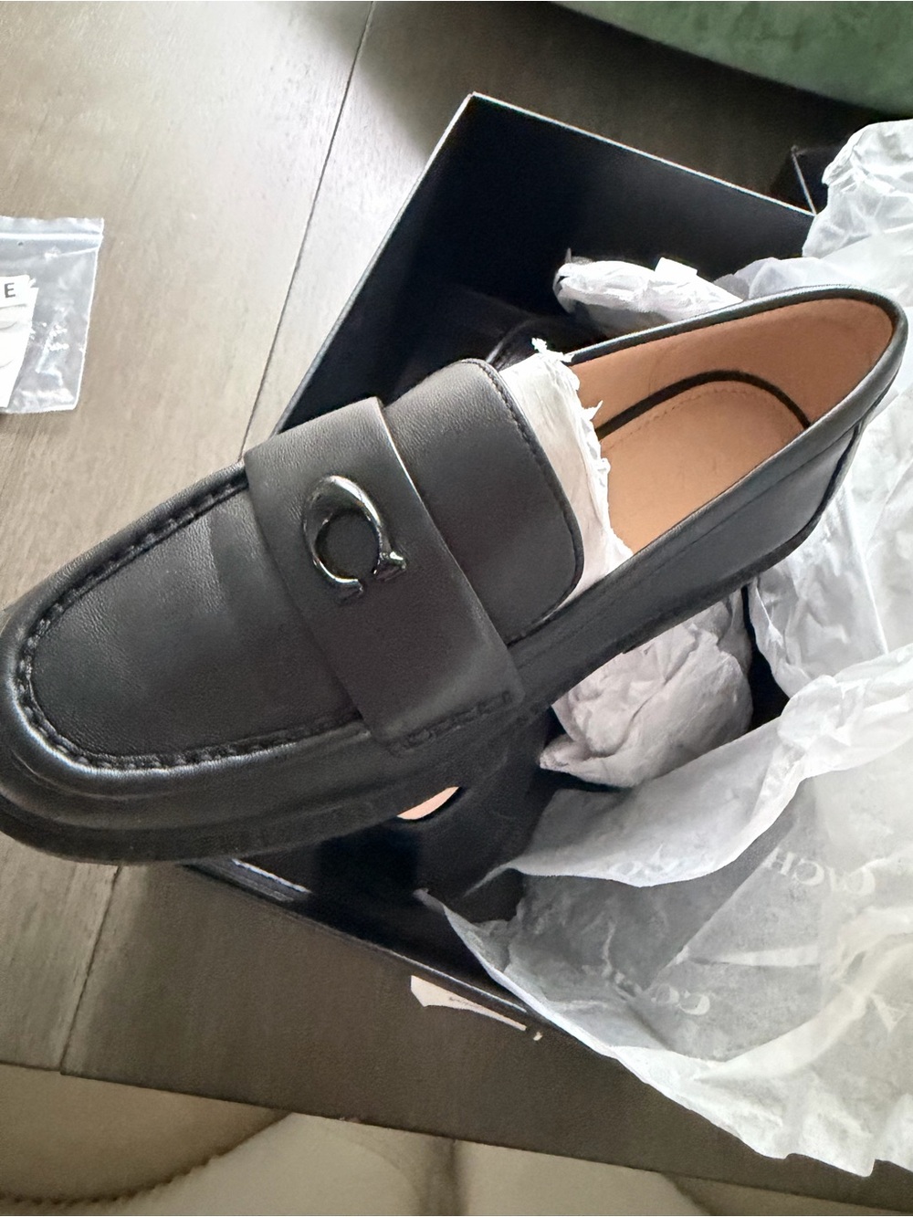 Coach Black Leather Women’s Slip-On Loafers with Metal O Emblem